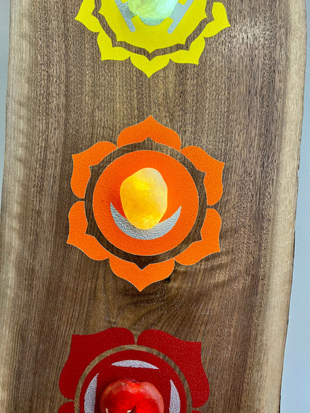 Walnut slab 6 ft with painted chakra symbols and natural crystals